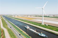Wind turbines, canal, transportation, Netherlands